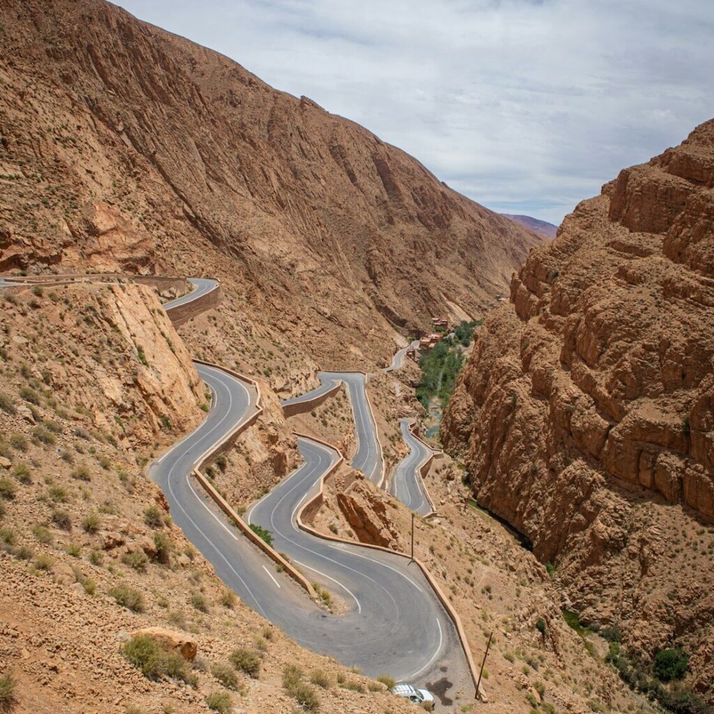 A winding road in the middle of a desert