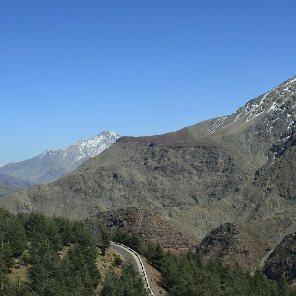 a view of a mountain with a road going through it